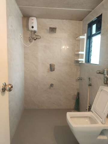Bathroom in 2 BHK Apartment at Gagangiri Northern Star, Dahisar West – for Sale