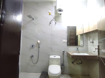 Bathroom in 4 BHK Apartment at Ansal Sushant Lok I, Sector 43 – for Rent