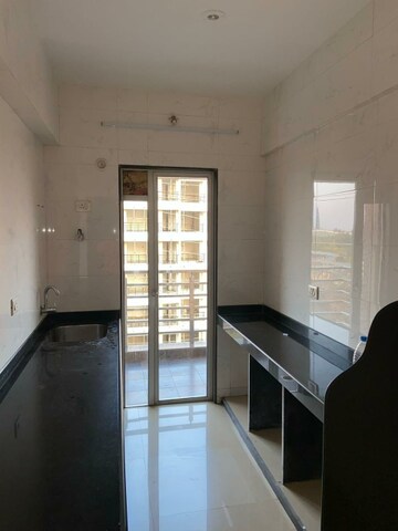 Kitchen in 2 BHK Apartment at Hi Tech Ultra The Gold Crest, Taloja – for Sale
