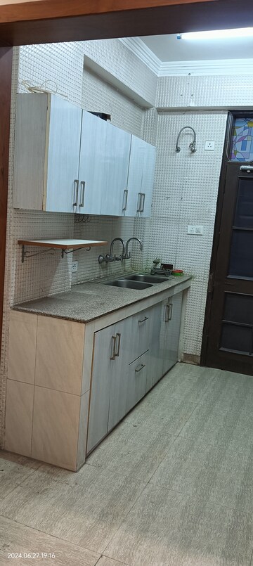 Kitchen in 3 BHK Apartment at New Generation Maple Apartments, Dhakoli Village – for Sale