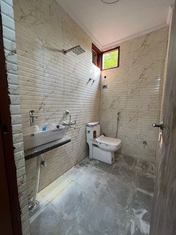 Bathroom in 2 BHK Builder Floor at Palm Residency Chhatarpur, Chattarpur – for Sale