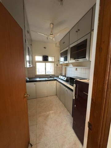 Kitchen in 3 BHK Apartment at Sky Scraper, Breach Candy – for Rent