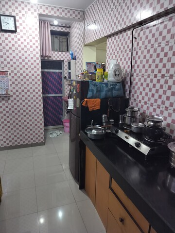 Kitchen in 1 BHK Apartment at Ashokvan Apartments, Dahisar East – for Sale