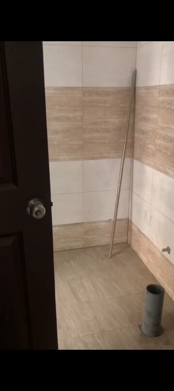 Bathroom in 2 BHK Apartment at Charms Castle Phase II, Raj Nagar Extension – for Sale