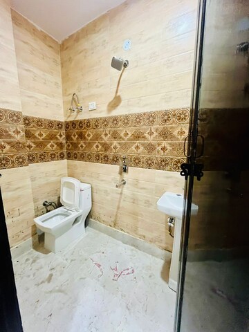 Bathroom in 3 BHK Builder Floor at Dwarka Mor – for Rent