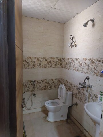 Bathroom in 3 BHK Builder Floor at Ambesten Twin County, Sector 1 Greater Noida – for Sale