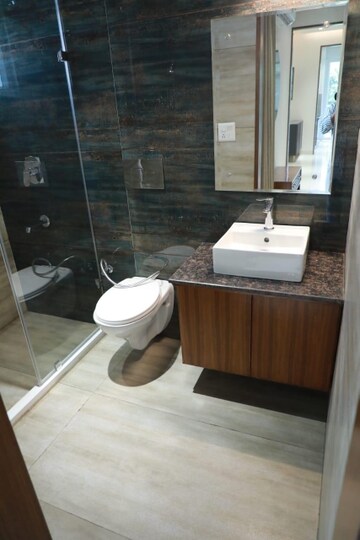 Bathroom in 4 BHK Apartment at Motia Blue Ridge, Dhakoli Village – for Sale