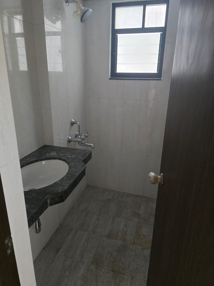 Bathroom, marvel-fria 2 Bedroom 955 Sq.Ft. Apartment In Wagholi Pune 7776070