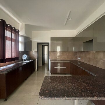 Kitchen in 4 BHK Villa at BPTP Amstoria, Sector 102 – for Sale