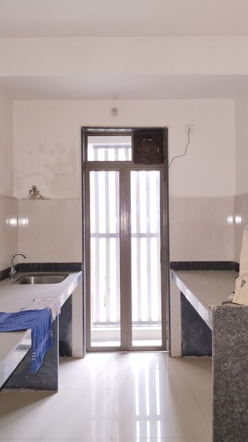 Kitchen in 1.5 BHK Apartment at Runwal My City Phase II Cluster 05, Dombivli East – for Sale