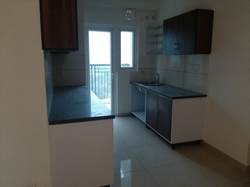 Kitchen in 2 BHK Apartment at Gulshan Botnia, Sector 144 – for Sale