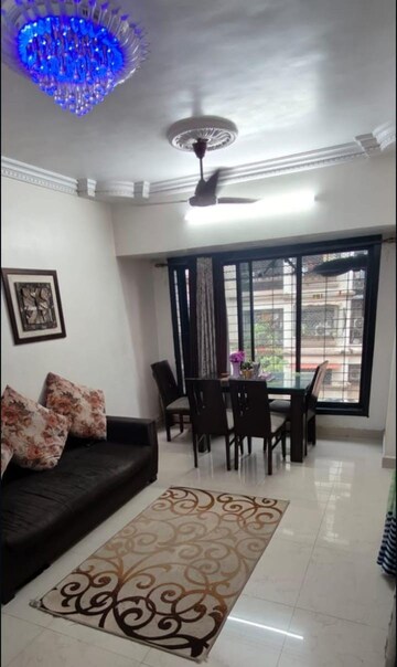 Living Room in 1 BHK Apartment at Sawan Elegance, Kopar Khairane – for Sale