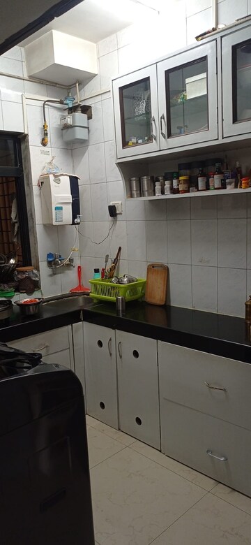 Kitchen in 1 BHK Apartment at Sawan Elegance, Kopar Khairane – for Sale