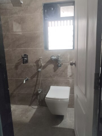 Bathroom in 2 BHK Apartment at Gagangiri Northern Star, Dahisar West – for Sale