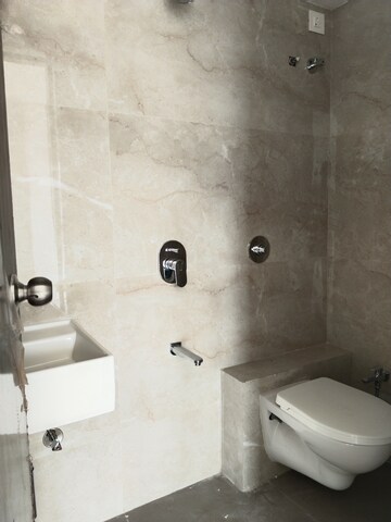 Bathroom in 2 BHK Apartment at Ami Vini Solitaire, Dahisar West – for Sale