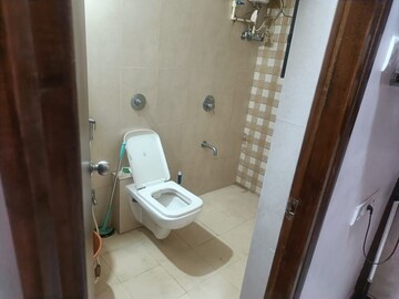 Bathroom in 3 BHK Apartment at Raunak Glory, Brahmand – for Sale