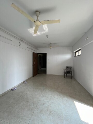 Living Room in 1 BHK Apartment at Lodha Palava City Lakeshore Greens, Dombivli East – for Sale