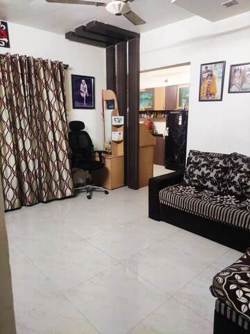 Living Room in 1 BHK Apartment at Greenfield Society, Hadapsar – for Sale