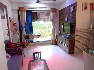 Living Room in 1 BHK Apartment at Highland Park CHS, Kandivali West – for Sale