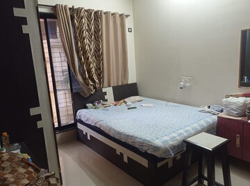Bedroom in 1 BHK Apartment at Highland Park CHS, Kandivali West – for Sale