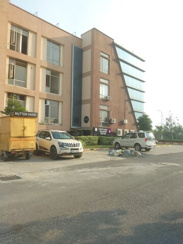  Office Space – Exterior View View at Ansal API Shopping Square, Sushant Golf City - for Sale