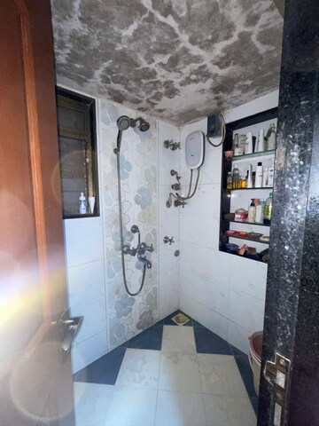 Bathroom in 2 BHK Apartment at Raj Shiv CHS, Dahisar East – for Sale