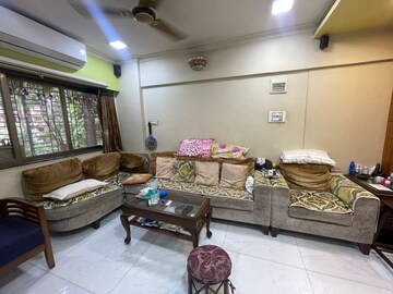 Living Room in 2 BHK Apartment at Raj Shiv CHS, Dahisar East – for Sale