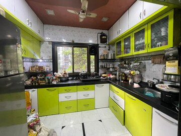 Kitchen in 2 BHK Apartment at Raj Shiv CHS, Dahisar East – for Sale