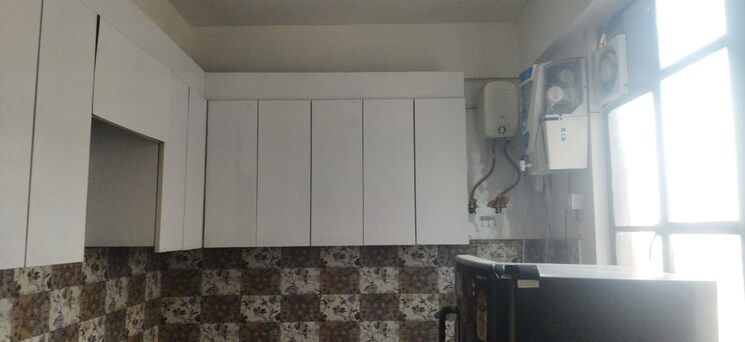 Kitchen, signature-global-proxima-phase-2 2 Bedroom 665 Sq.Ft. Apartment In Sector 89 Gurgaon 7783914