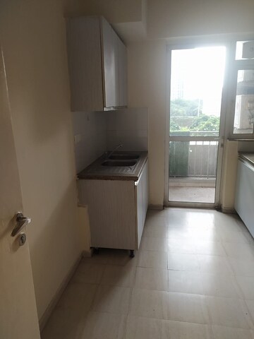 Kitchen in 3 BHK Apartment at DLF Regal Gardens, Sector 90 – for Rent