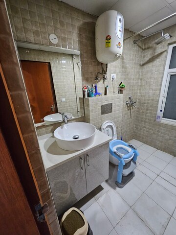 Bathroom in 3 BHK Apartment at DLF Regal Gardens, Sector 90 – for Rent
