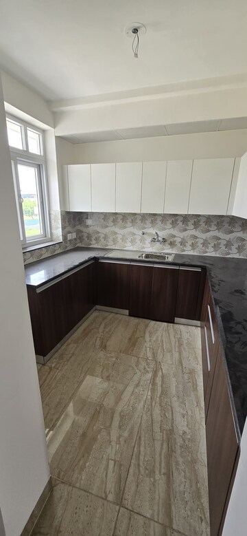Kitchen in 2.5 BHK Apartment at Wave Floors, Mahurali – for Sale