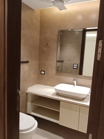 Bathroom in 4 BHK Builder Floor at Green Park – for Sale