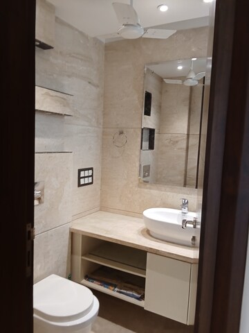 Bathroom in 4 BHK Builder Floor at Green Park – for Sale