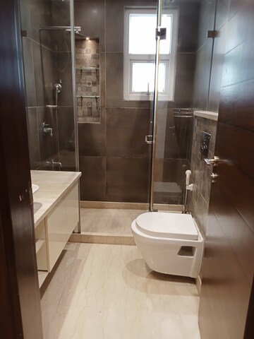 Bathroom in 4 BHK Builder Floor at Green Park – for Sale