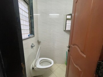 Bathroom in 2 BHK Apartment at Raj Shiv CHS, Dahisar East – for Sale