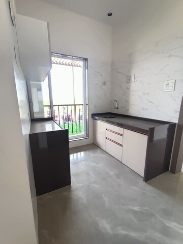 Kitchen in 1 BHK Apartment at Rajlaxmi Nakshatra Auris, Nalasopara West – for Sale