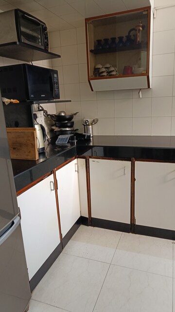 Kitchen in 2 BHK Apartment at Marine Drive – for Sale