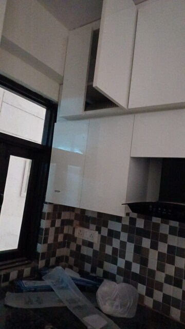 Kitchen in 2 BHK Apartment at KM Residency, Raj Nagar Extension – for Sale