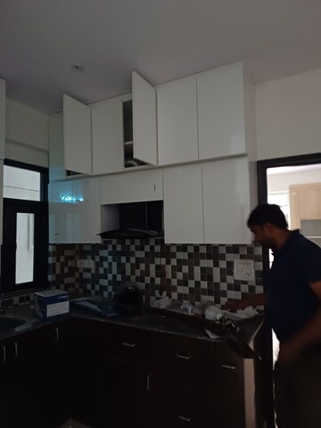 Kitchen in 2 BHK Apartment at KM Residency, Raj Nagar Extension – for Sale