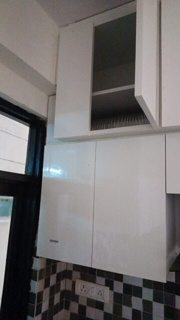 Kitchen in 2 BHK Apartment at KM Residency, Raj Nagar Extension – for Sale