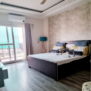 Bedroom in 4 BHK Builder Floor at Ansal API Esencia, Sector 67 – for Rent