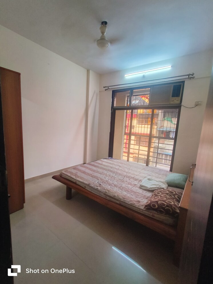 Bedroom, tharwani-palladian 2 Bedroom 805 Sq.Ft. Apartment In Kharghar Navi Mumbai 7788360