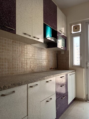 Kitchen in 3 BHK Apartment at DLF The Skycourt, Sector 86 – for Sale