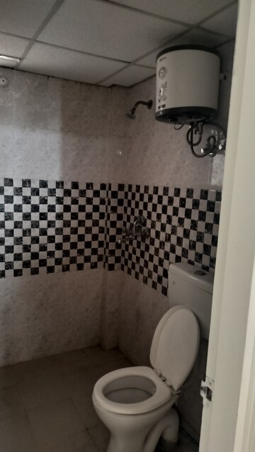Bathroom in 2 BHK Apartment at Signature Orchard Avenue 2, Sector 93 – for Sale
