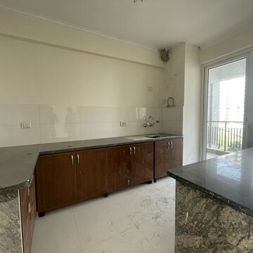 Kitchen in 4 BHK Apartment at Pareena The Elite Residences, Gopalpur – for Sale