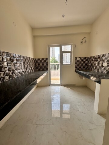 Kitchen in 2 BHK Apartment at VVIP Mangal, Raj Nagar Extension – for Sale