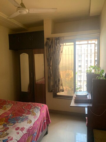 Bedroom in 2.5 BHK Apartment at Madhav Palacia, Ghodbunder Road – for Sale