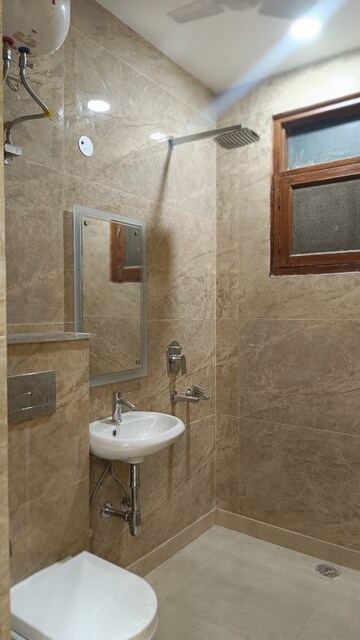 Bathroom in 2.5 BHK Builder Floor at Paschim Vihar – for Sale