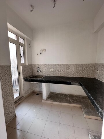 Kitchen in 2 BHK Apartment at Aditya Luxuria Estate, Dasna – for Sale